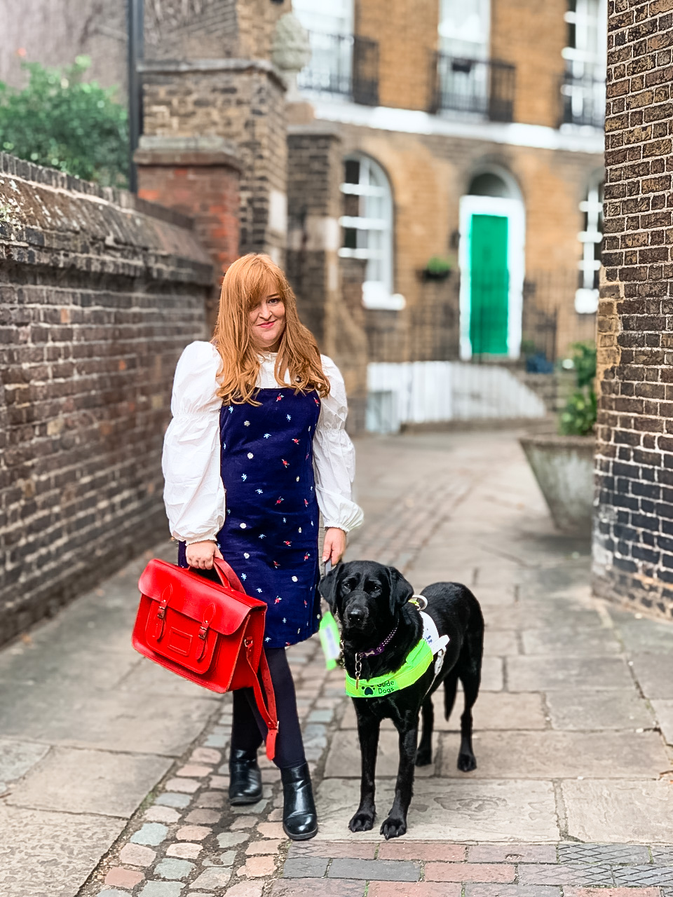A photo of Emily and guide dog Rosie